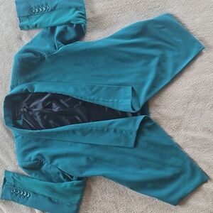 BCBG MAXAZRIA blazer in size S and in teal color. Great condition